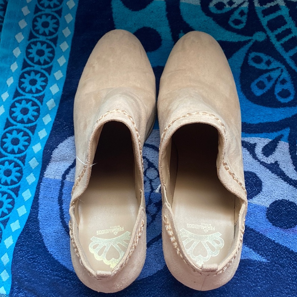 Uses Woman’s Tan Booties